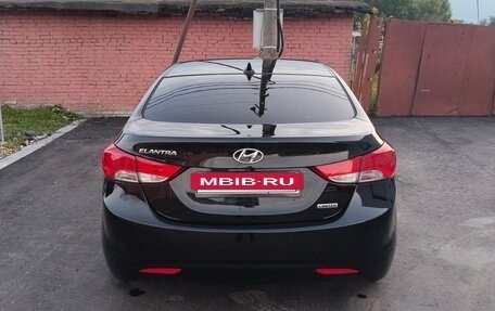 Hyundai Elantra V, 2013 год, 949 000 рублей, 2 фотография