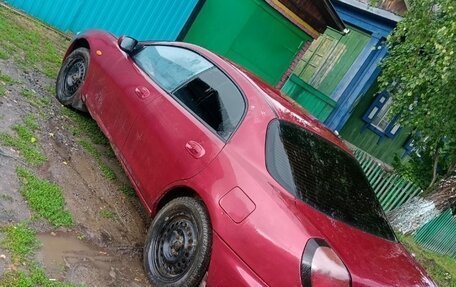 Mazda Lantis, 1993 год, 115 000 рублей, 2 фотография