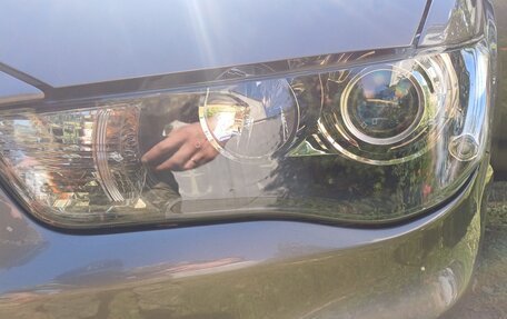 Mitsubishi Outlander III рестайлинг 3, 2011 год, 1 800 000 рублей, 12 фотография