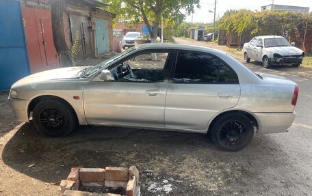 Mitsubishi Lancer VII, 1998 год, 250 000 рублей, 2 фотография