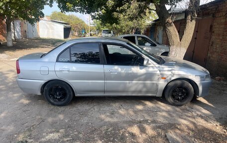 Mitsubishi Lancer VII, 1998 год, 250 000 рублей, 4 фотография