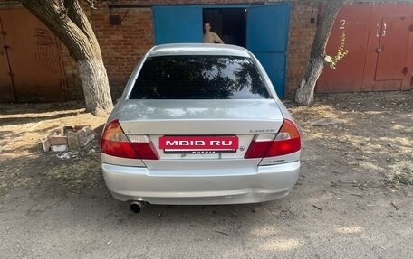 Mitsubishi Lancer VII, 1998 год, 250 000 рублей, 3 фотография