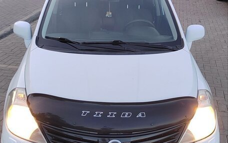 Nissan Tiida, 2011 год, 890 000 рублей, 22 фотография