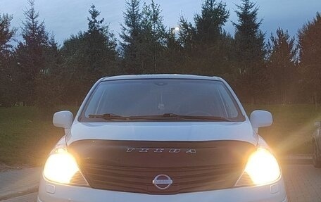 Nissan Tiida, 2011 год, 890 000 рублей, 21 фотография