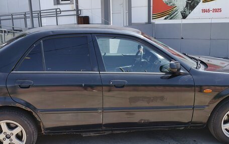 Mazda 323, 2002 год, 240 000 рублей, 9 фотография