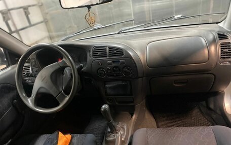 Mitsubishi Colt VI рестайлинг, 1998 год, 300 000 рублей, 13 фотография