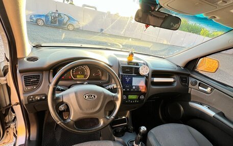 KIA Sportage II, 2009 год, 1 300 000 рублей, 16 фотография