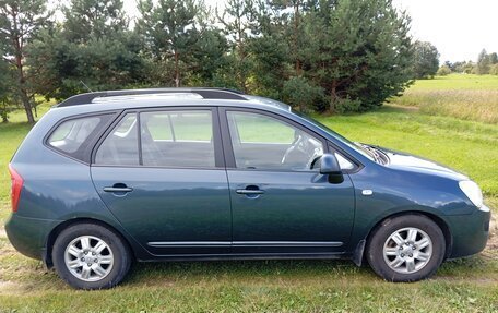 KIA Carens III (RP), 2010 год, 860 000 рублей, 4 фотография