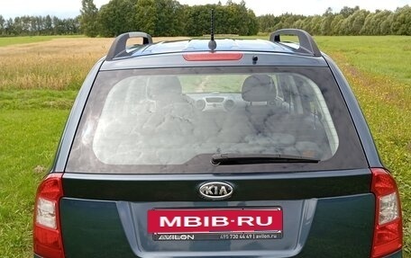 KIA Carens III (RP), 2010 год, 860 000 рублей, 6 фотография