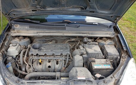 KIA Carens III (RP), 2010 год, 860 000 рублей, 16 фотография