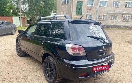Mitsubishi Outlander III рестайлинг 3, 2006 год, 600 000 рублей, 4 фотография