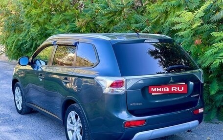 Mitsubishi Outlander III рестайлинг 3, 2014 год, 1 480 000 рублей, 9 фотография