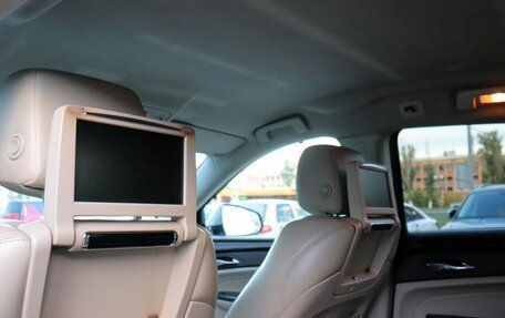 Cadillac SRX II рестайлинг, 2012 год, 1 400 000 рублей, 17 фотография