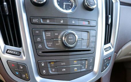 Cadillac SRX II рестайлинг, 2012 год, 1 400 000 рублей, 19 фотография