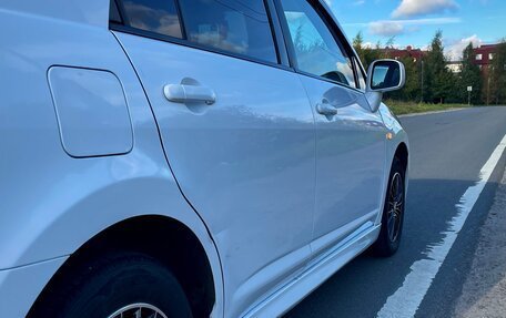Nissan Tiida, 2013 год, 740 000 рублей, 24 фотография