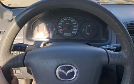 Mazda 323, 2000 год, 160 000 рублей, 13 фотография