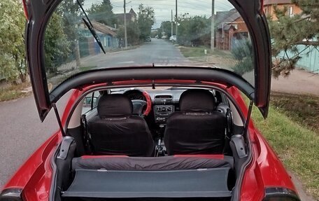 Opel Tigra, 1998 год, 350 000 рублей, 10 фотография