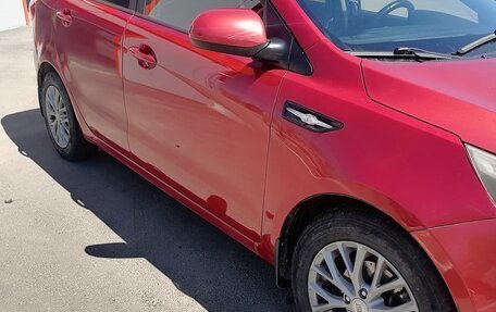 KIA Rio III рестайлинг, 2013 год, 10 фотография