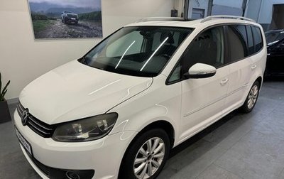 Volkswagen Touran III, 2011 год, 799 000 рублей, 1 фотография