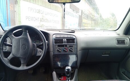 Toyota Avensis III рестайлинг, 1999 год, 300 000 рублей, 10 фотография