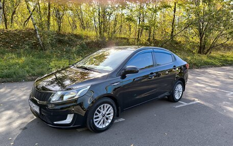 KIA Rio III рестайлинг, 2011 год, 950 000 рублей, 2 фотография