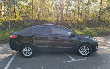 KIA Rio III рестайлинг, 2011 год, 950 000 рублей, 24 фотография