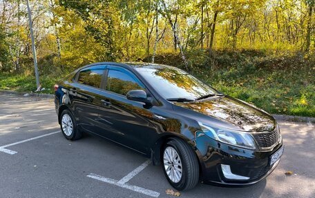 KIA Rio III рестайлинг, 2011 год, 950 000 рублей, 21 фотография
