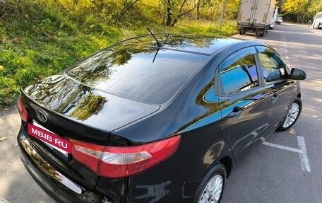 KIA Rio III рестайлинг, 2011 год, 950 000 рублей, 23 фотография