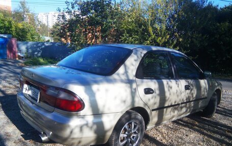 Mazda 323, 1995 год, 330 000 рублей, 5 фотография