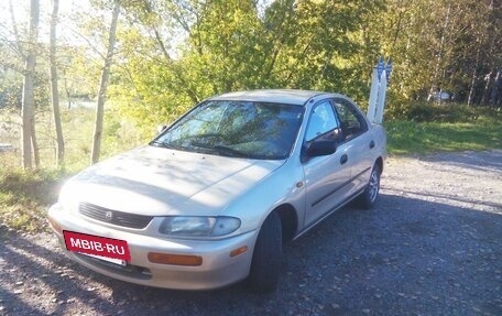 Mazda 323, 1995 год, 330 000 рублей, 11 фотография