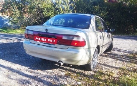 Mazda 323, 1995 год, 330 000 рублей, 6 фотография