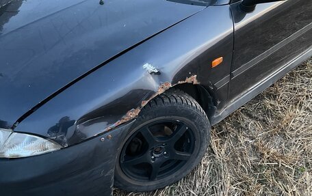 Mitsubishi Carisma I, 1997 год, 130 000 рублей, 7 фотография