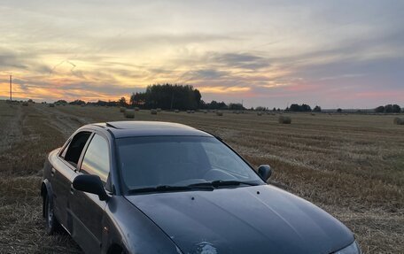 Mitsubishi Carisma I, 1997 год, 130 000 рублей, 4 фотография