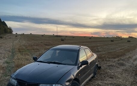 Mitsubishi Carisma I, 1997 год, 130 000 рублей, 2 фотография