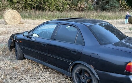 Mitsubishi Carisma I, 1997 год, 130 000 рублей, 8 фотография