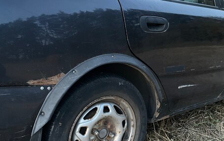 Mitsubishi Carisma I, 1997 год, 130 000 рублей, 11 фотография