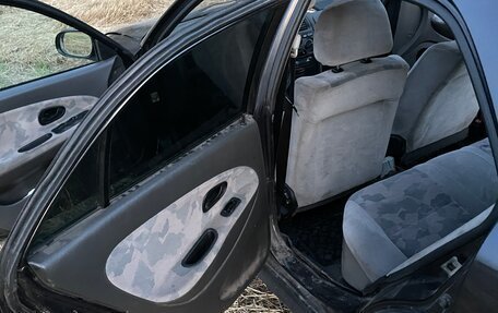 Mitsubishi Carisma I, 1997 год, 130 000 рублей, 21 фотография