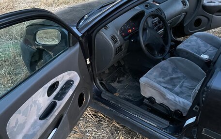 Mitsubishi Carisma I, 1997 год, 130 000 рублей, 20 фотография