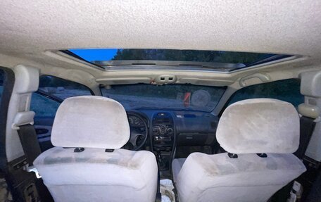 Mitsubishi Carisma I, 1997 год, 130 000 рублей, 27 фотография