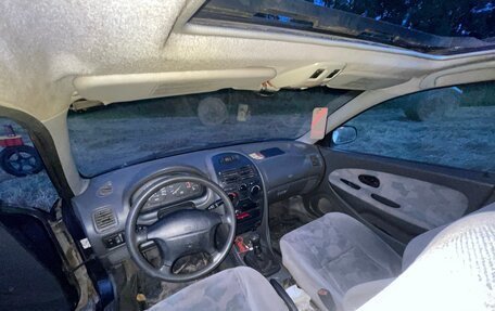 Mitsubishi Carisma I, 1997 год, 130 000 рублей, 26 фотография