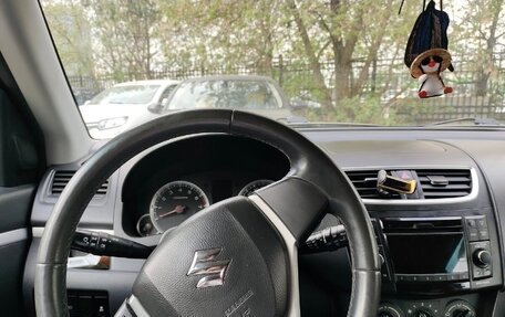 Suzuki Swift IV, 2011 год, 650 000 рублей, 12 фотография