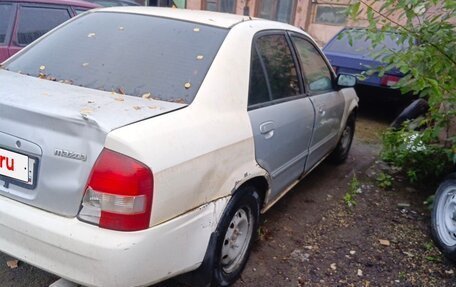 Mazda Familia, 1999 год, 120 000 рублей, 3 фотография