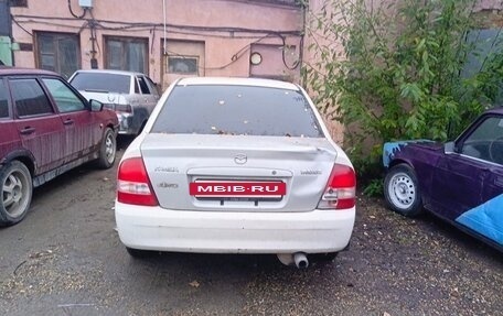 Mazda Familia, 1999 год, 120 000 рублей, 4 фотография