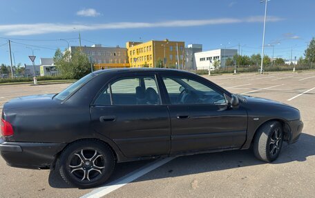 Mitsubishi Carisma I, 1999 год, 150 000 рублей, 6 фотография