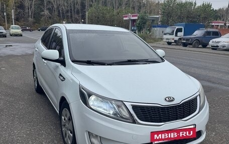 KIA Rio III рестайлинг, 2013 год, 670 000 рублей, 3 фотография