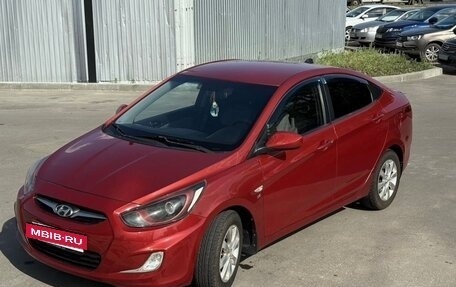 Hyundai Solaris II рестайлинг, 2011 год, 630 000 рублей, 11 фотография