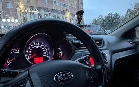 KIA Rio III рестайлинг, 2014 год, 970 000 рублей, 21 фотография