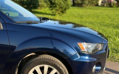 Mitsubishi Outlander III рестайлинг 3, 2011 год, 1 300 000 рублей, 17 фотография