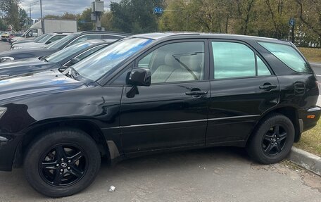 Lexus RX IV рестайлинг, 2000 год, 830 000 рублей, 2 фотография