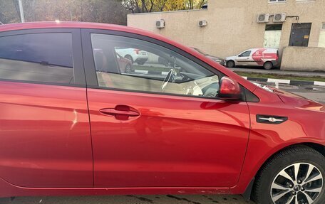 KIA Rio III рестайлинг, 2012 год, 900 000 рублей, 29 фотография